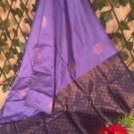 Purple Semi Soft Silk Saree with Golden Border and Floral Motifs