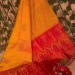 Bright Yellow and Red Semi Soft Silk Saree with Floral Border Design