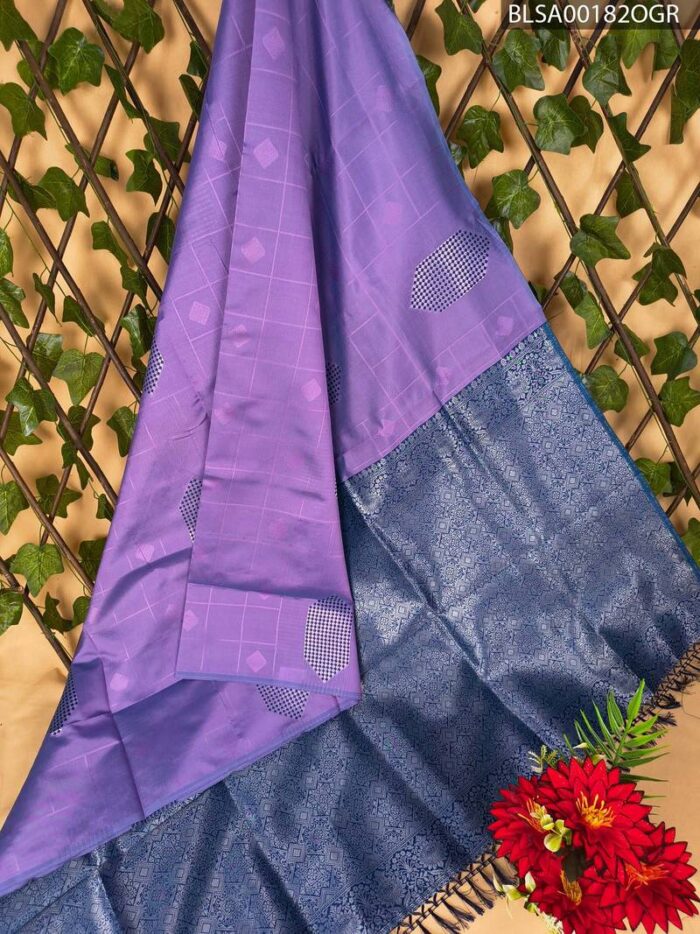 Beautiful Purple and Navy Blue Semi Soft Silk Saree with Geometric Patterns and Rich Border - Image 1