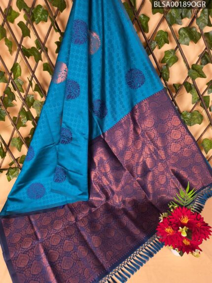 Elegant Teal and Purple Semi Soft Silk Saree with Floral Motifs and Contrast Border