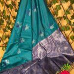 Teal Blue Semi Soft Silk Saree with Floral Motifs and Rich Silver Border