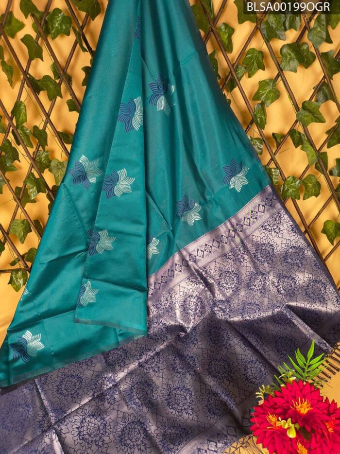Teal Blue Semi Soft Silk Saree with Floral Motifs and Rich Silver Border - Image 1