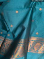 Teal Semi Soft Silk Saree with Rich Floral Motifs and Contrast Blue Border - Image 2