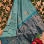 Teal Semi Soft Silk Saree with Rich Floral Motifs and Contrast Blue Border