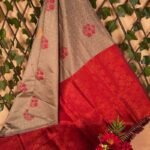 Beige and Red Semi Soft Silk Saree with Floral Motifs and Rich Pallu