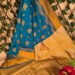 Teal and Gold Semi Soft Silk Saree with Floral Motifs and Contrast Pallu