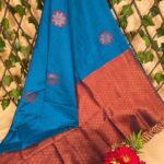 Beautiful Blue and Brown Semi Soft Silk Saree with Floral Motifs and Elegant Border